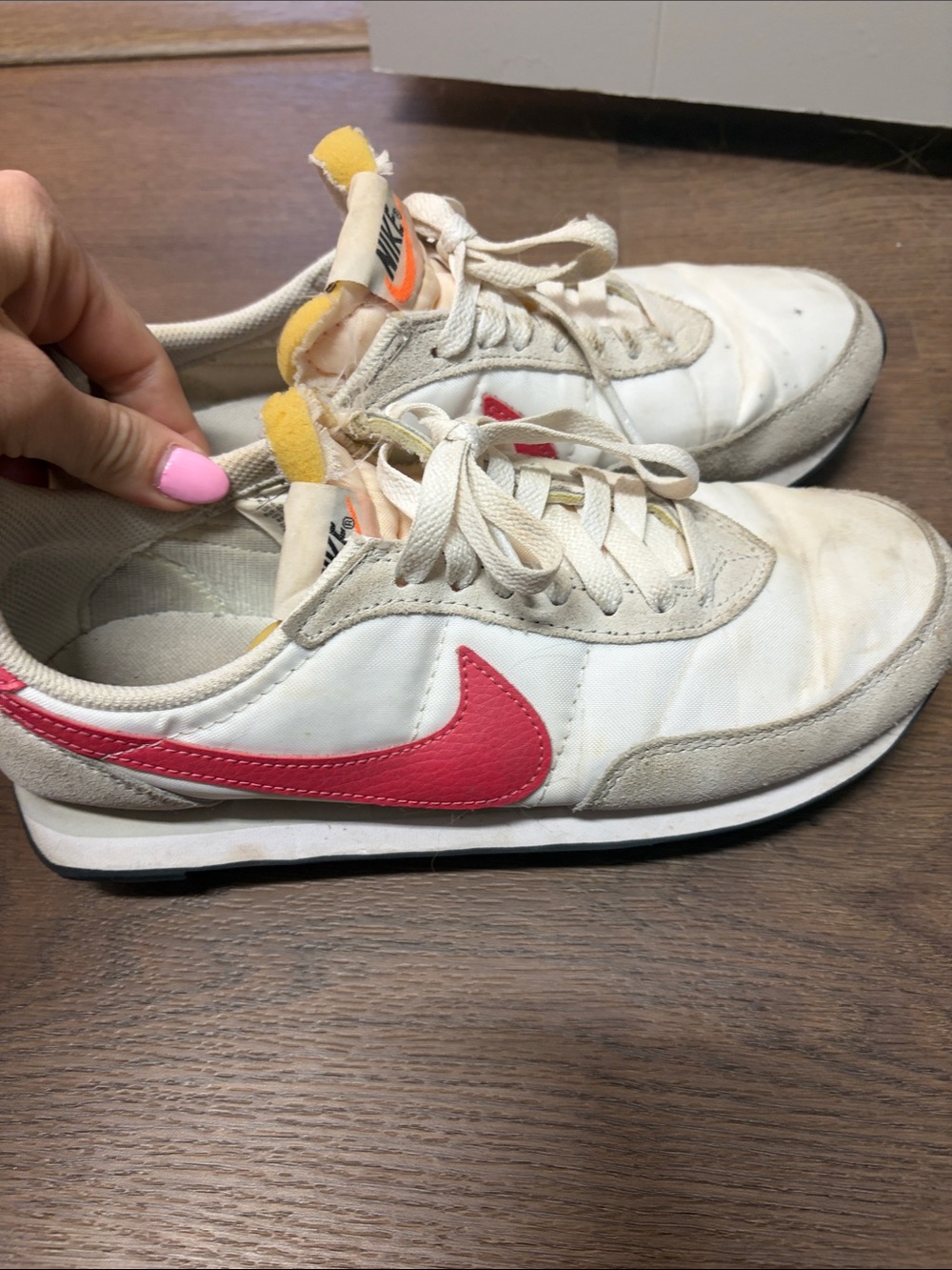Nike White Sneakers with Pink Swoosh and Yellow Tongue